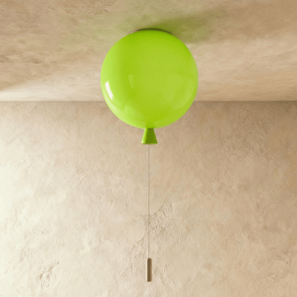 Clérachic round green ceiling light shaped like a balloon, switched off, with a green cone neck and a slim pull cord with a wooden toggle.