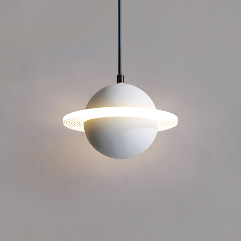 A smooth white Clérachic pendant sphere with a glowing ridged ring and a halo on a grey wall.