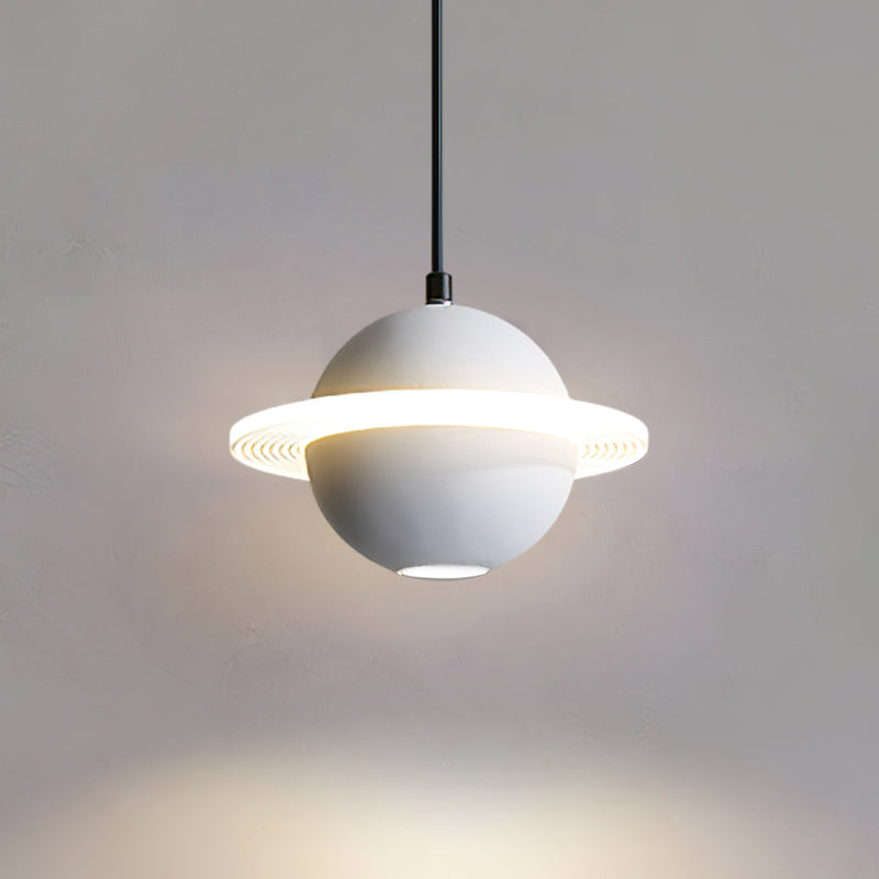 White Clérachic pendant with a lit ring, seen with a spot of downlight and a soft wash of light below on a grey wall.
