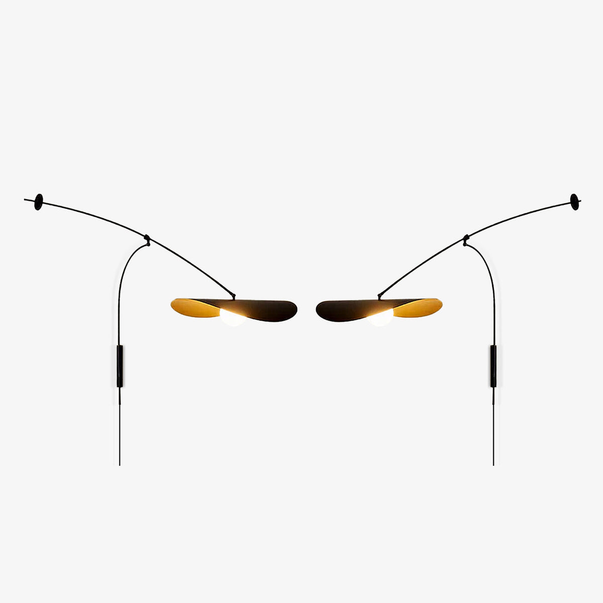 Two Clérachic wall lights shown as a mirrored left and right pair on light grey, each with a gold-lined shade.