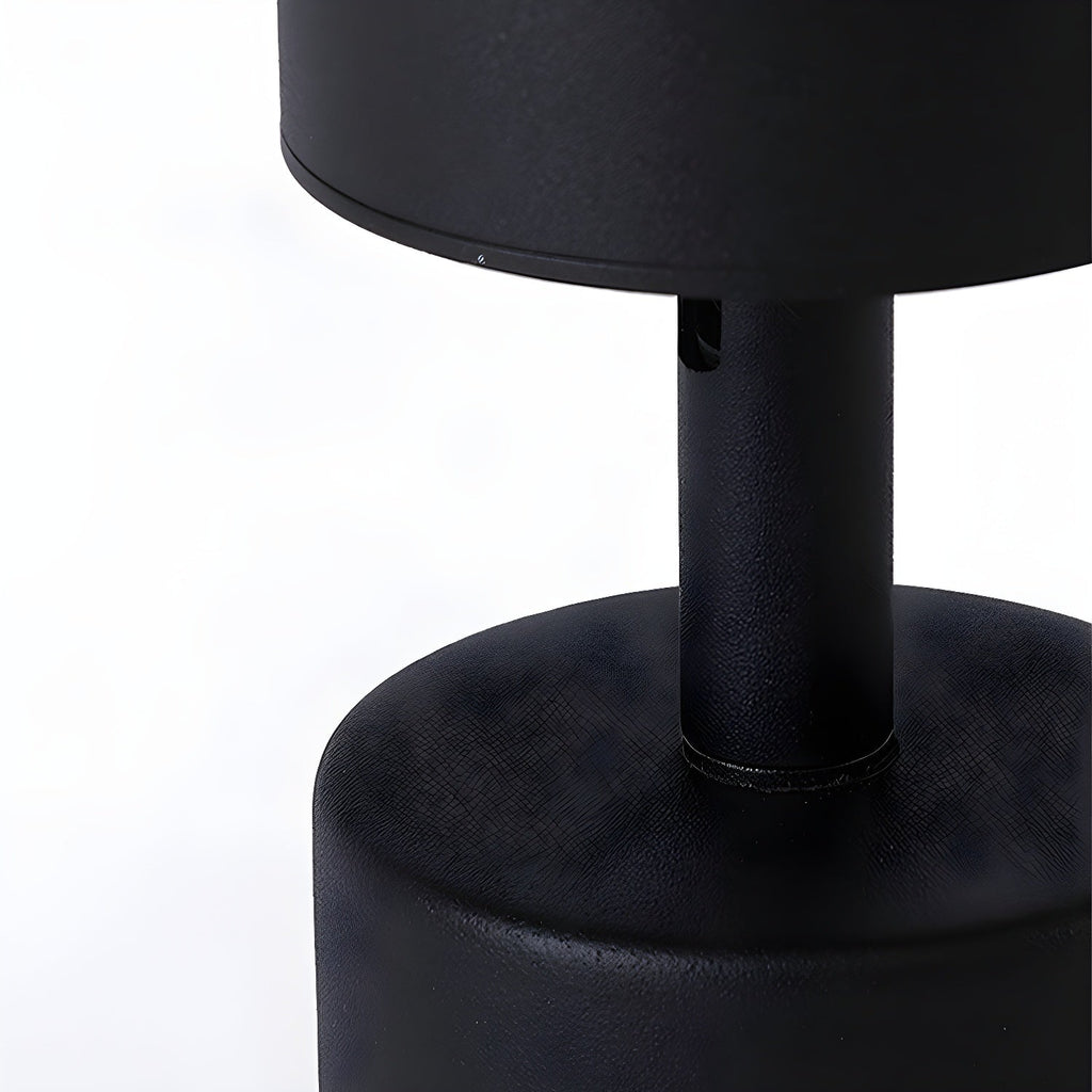 Close view of the black stem where the cylinder meets the canopy on this Clérachic spotlight, with a matt finish.