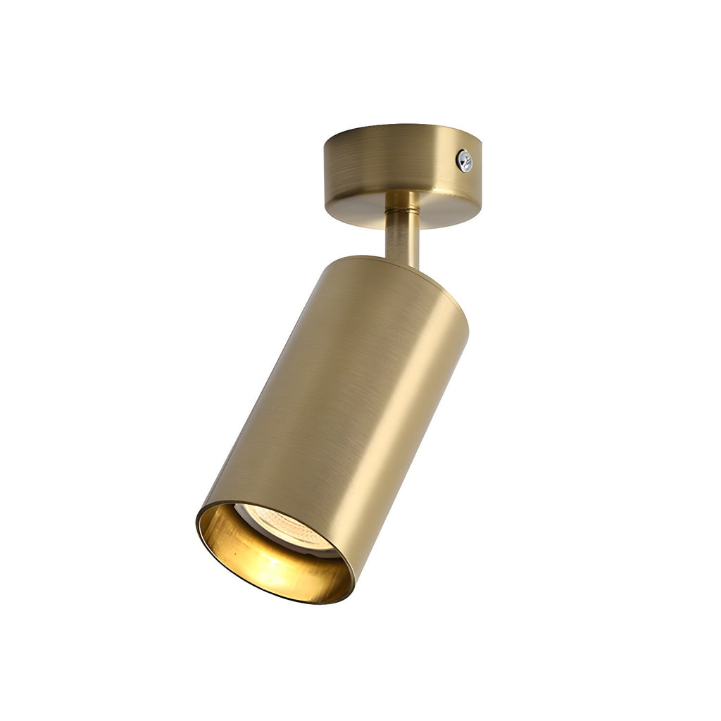 Gold Clérachic spotlight with a brushed cylinder head tilted down from a round gold canopy, on a clean white background.
