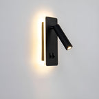 Clérachic reading wall light in black, its rotating spot beside a warm backlit panel.