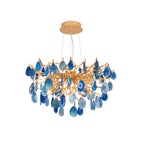 Blue agate Clérachic chandelier, front-on, on a plain white backdrop, with a gold canopy and three fine suspension wires.