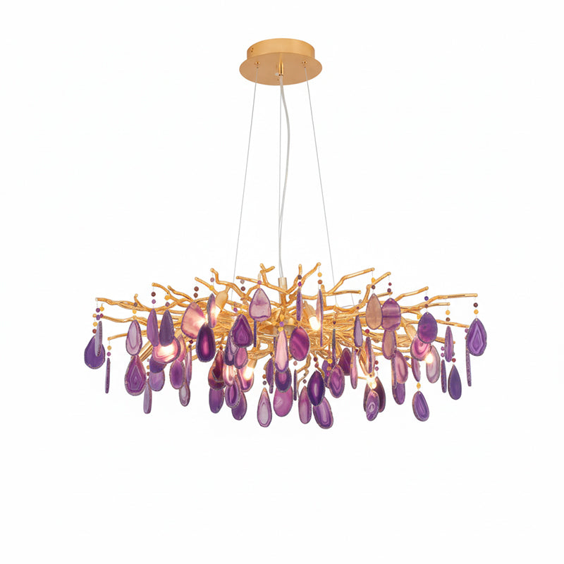 Purple agate Clérachic chandelier on a white backdrop, with violet slices hanging from a wide gold branch frame.