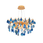 Compact blue agate Clérachic chandelier on a white backdrop, with navy and sky-blue slices clustered under a gold canopy.