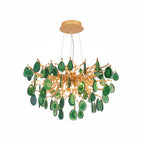 Compact green agate Clérachic chandelier on a white backdrop, with deep green teardrop slices around a gold branch centre.