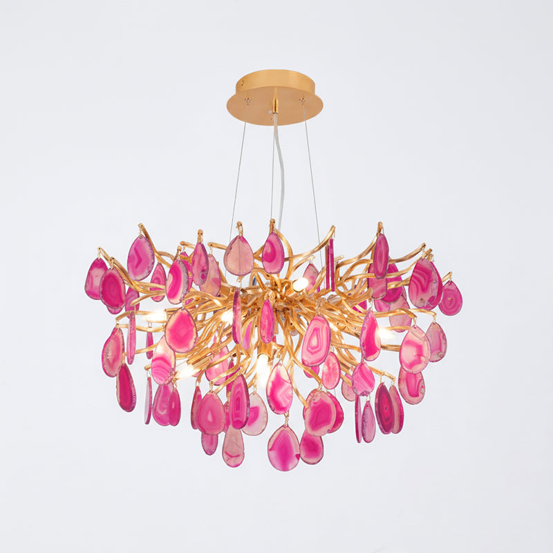 Compact pink agate Clérachic chandelier on a pale backdrop, with magenta and rose slices around a gold branch centre.