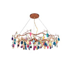 Clérachic agate chandelier with mixed-colour slices and a rose-gold ceiling plate, on a plain white backdrop.