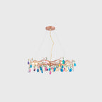 Small view of a multicolour Clérachic agate chandelier on a pale grey backdrop, with its cord hanging from a rose-gold ceiling plate.