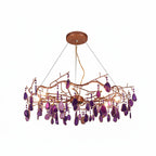 Purple-slice Clérachic agate chandelier on a white backdrop, with violet stones hanging from rose-gold branches.