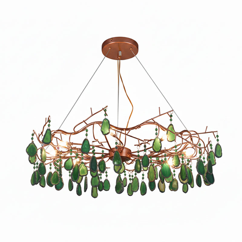 Green-slice Clérachic agate chandelier on a white backdrop, with emerald slices and bulbs lit along the rose-gold frame.
