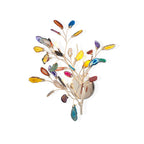 Multicolour agate branches spread from the gold back plate of this Clérachic wall light on a white backdrop.
