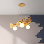 Underside view of the Clérachic airplane light on a white ceiling, with a stepped navy and grey painted wall behind.