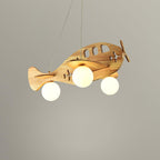 Clérachic wooden airplane light lit on a plain grey backdrop, its cut-out windows and three globes clearly visible.