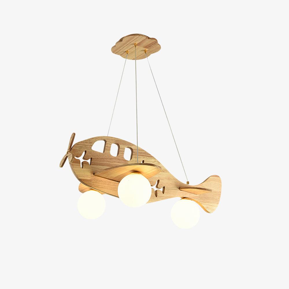A Clérachic wooden airplane light on a plain white backdrop, with warm light glowing from its three round globes.