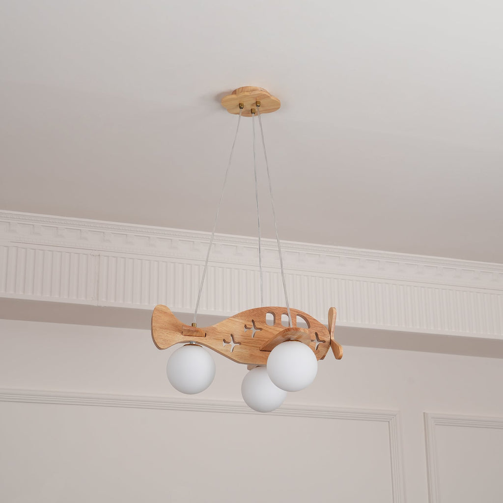 Clérachic airplane pendant hung below a ceiling cornice, with a plain white globe under each wing, seen from further back.