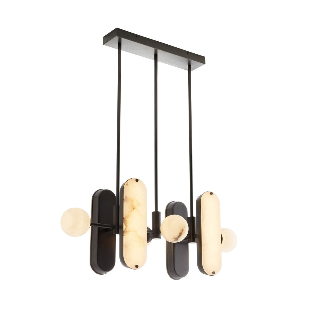 Angled view of the lit Clérachic Alabaster 5-Light Linear Island Pendant, dark bronze backplates sitting behind each glowing alabaster capsule.