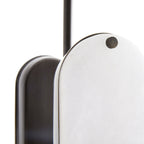Close-up on the Clérachic Alabaster 5-Light Linear Island Pendant, where a knurled bronze screw pins the stone shade to its dark backplate.