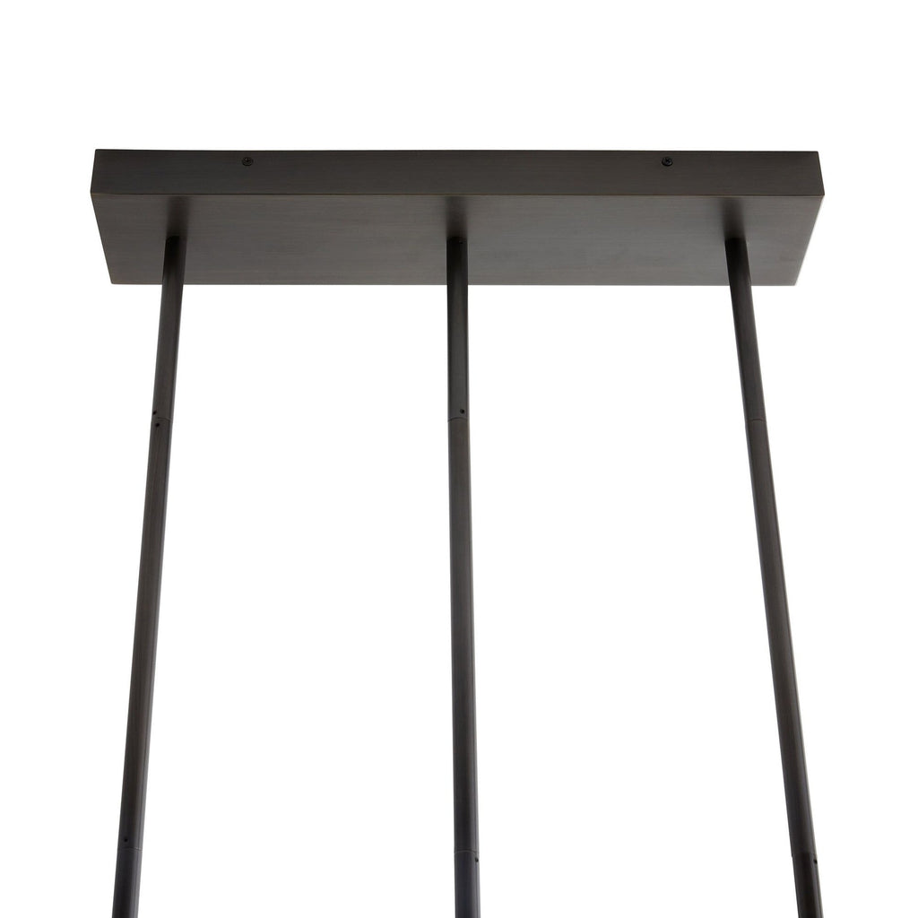 Ceiling canopy of the Clérachic Alabaster 5-Light Linear Island Pendant, a slim bronze rectangle feeding three drop rods for a hardwired fit.