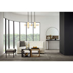 Wide shot of a Clérachic Alabaster 5-Light Linear Island Pendant lighting a lounge, small against a tall curved window over the water.