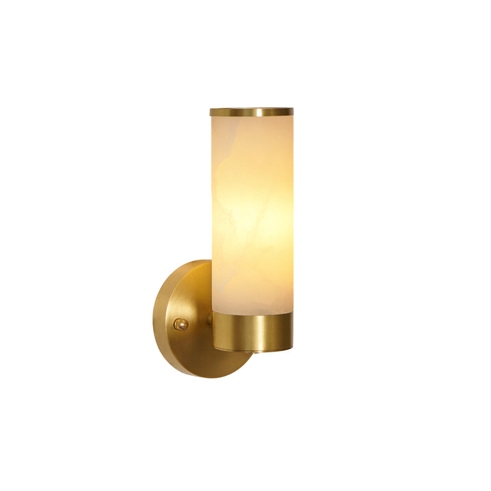 Clérachic Alabaster and Brass Wall Sconce on a plain white backdrop, one upright stone cylinder held in a brass collar.