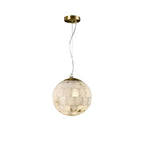 Clérachic alabaster ball pendant, tiled stone sphere hung from a brass canopy on a clear cable.