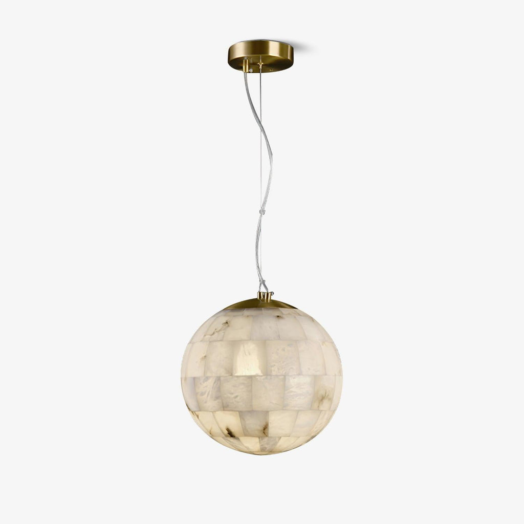 The Clérachic alabaster ball pendant on white, its stone tiles lit warm from inside the globe.