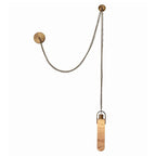 Clérachic Alabaster Capsule Pendant Light in the single-head version, one stone capsule on a swagged brass chain and ceiling hook.