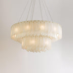 The two-tier Clérachic cascade chandelier, stone blades stepping down in layered rings.