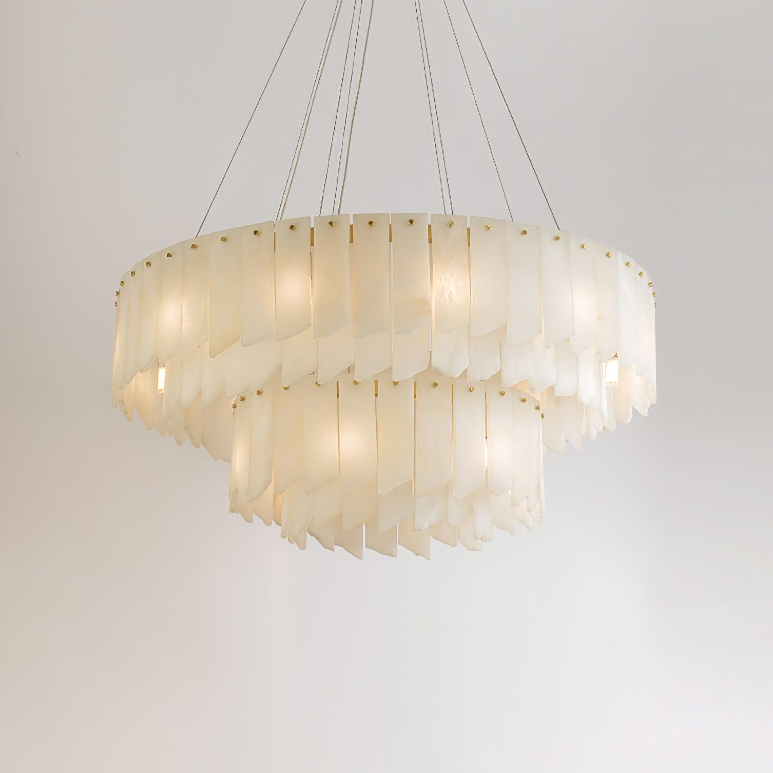The two-tier Clérachic cascade chandelier, stone blades stepping down in layered rings.