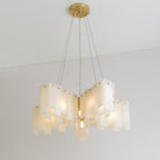 Clérachic cascade chandelier in a stepped square form, alabaster blocks around a brass column.