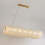 Clérachic cascade chandelier in its long linear form, alabaster blades along a brass bar.