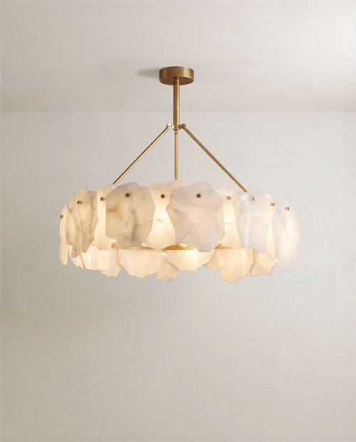 Clérachic round chandelier with irregular white alabaster panels on a brass ring, hung from three brass arms and a round canopy.