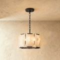 Clérachic alabaster drum chandelier, 48 cm wide, in matte black on a short chain against a limewashed wall