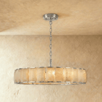 Clérachic wide alabaster chandelier, 147 cm across, polished stainless steel frame, lit warm below a steel canopy