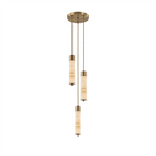 Two brass-capped alabaster columns glow warm on this Clérachic chandelier, staggered at different heights on a plain background.