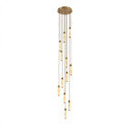 A wide cascade of brass-capped alabaster columns glows warm on this Clérachic chandelier, shown on a plain background.