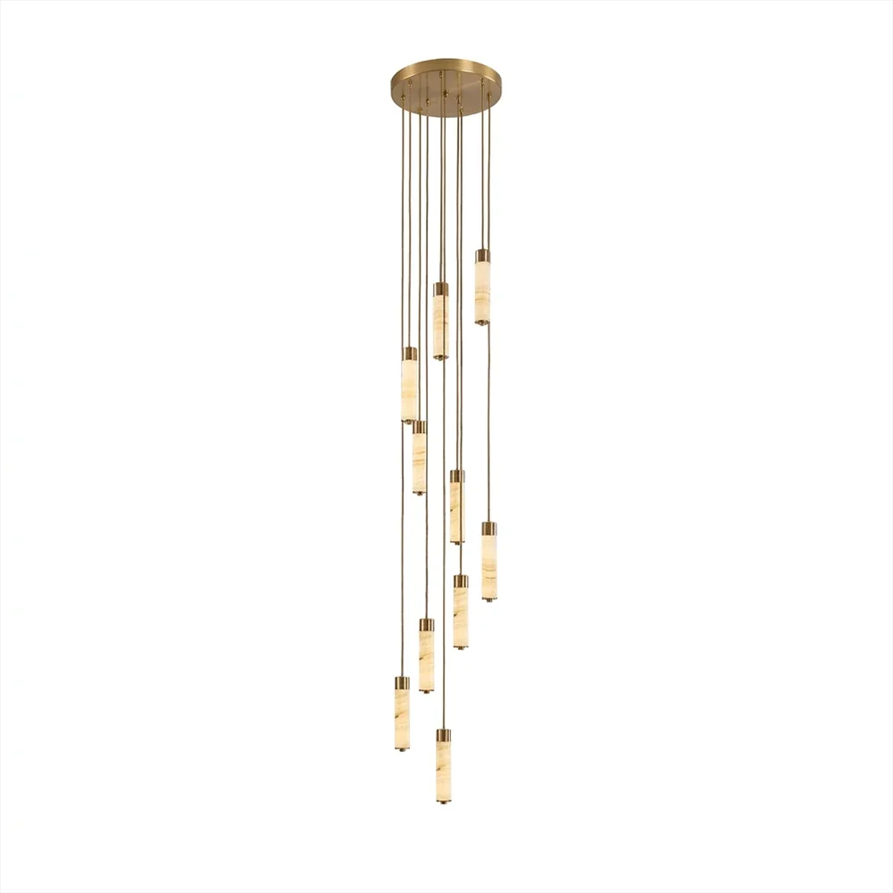 A tall cascade of brass-capped alabaster columns glows warm on this Clérachic chandelier, shown on a plain background.