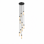 A dense cluster of black-capped alabaster columns glows warm on this Clérachic chandelier, shown on a plain background.