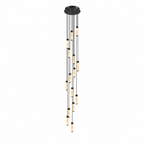A dense spiral of black-capped alabaster columns glows warm on this Clérachic chandelier, shown on a plain background.