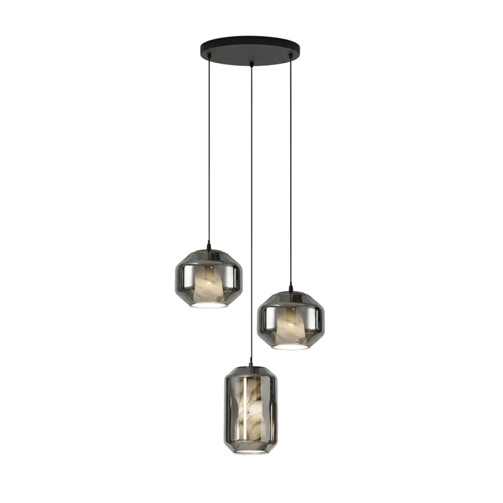 Three smoke grey glass Clérachic pendants, two wide and one tall, hang from a round black canopy on a white backdrop.