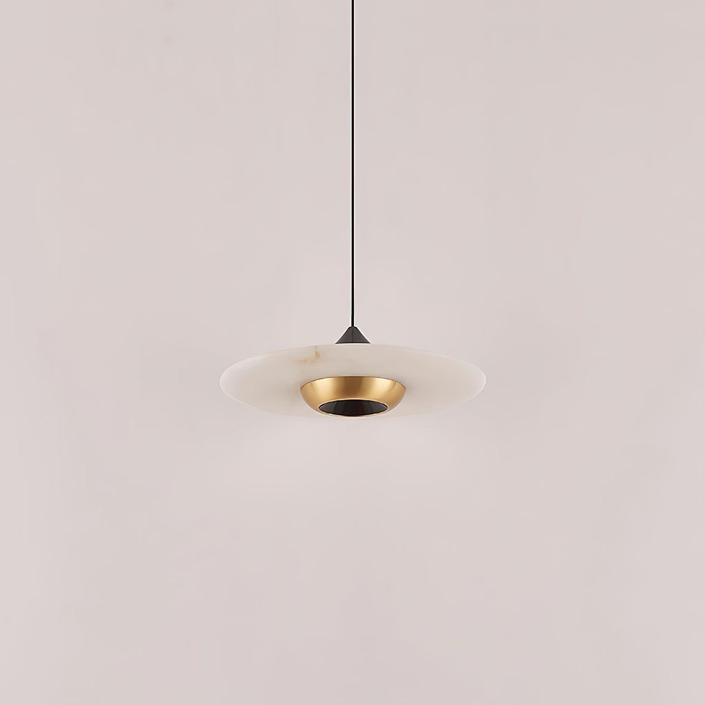 Clérachic Alabaster Disc Pendant Light switched off, showing the stone veining and the polished brass bowl at its centre.