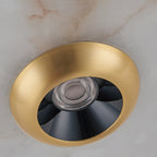 Integrated LED module recessed inside the brass bowl of the Clérachic Alabaster Disc Pendant Light, seen from directly below.