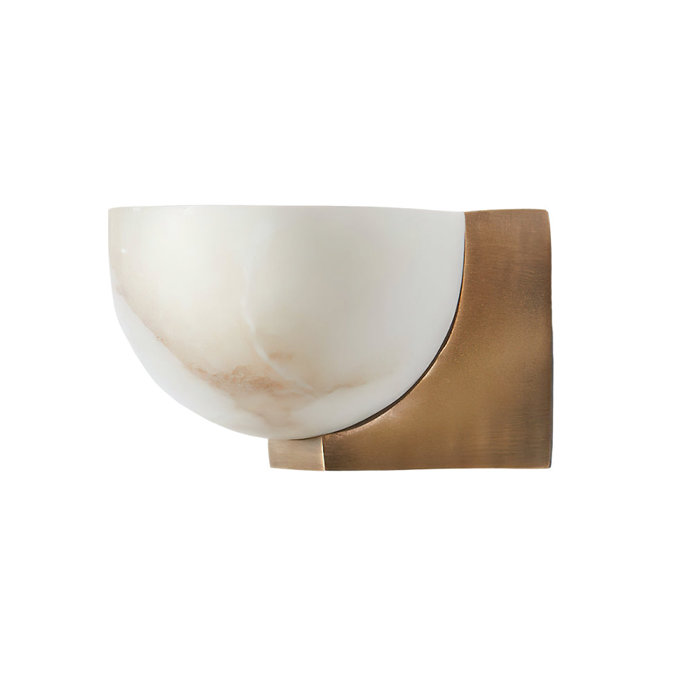 Cut-out view of this Clérachic alabaster wall light with a brass bracket and a white dome marked with pale tan veining.