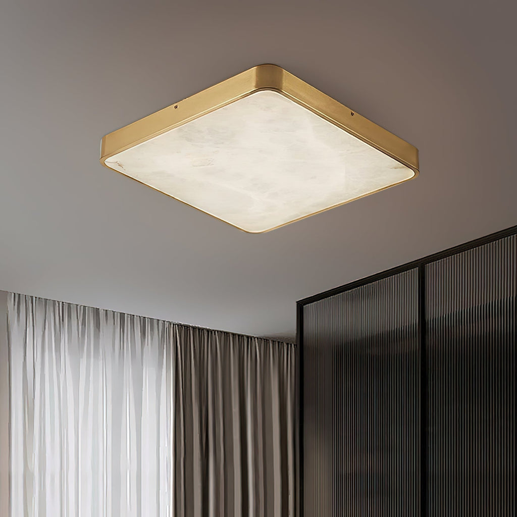 Square Clérachic alabaster flush ceiling light lit on a grey ceiling beside fluted glass screens and floor-length curtains.