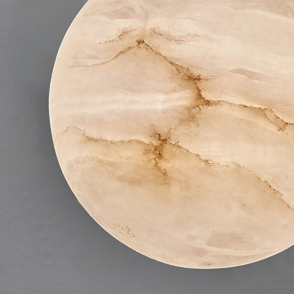 Macro detail of the Clérachic alabaster shade, natural stone veining and translucent grain filling the frame