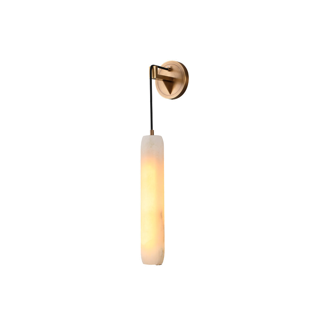 The Clérachic sconce from a slight angle, its slim brass arm dropping the glowing alabaster shade clear of the wall.