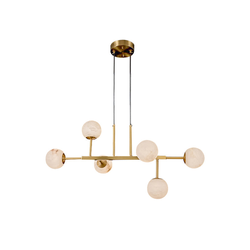 The Clérachic Alabaster Globe Chandelier unlit on a plain white background, showing the six-light brass frame in full.