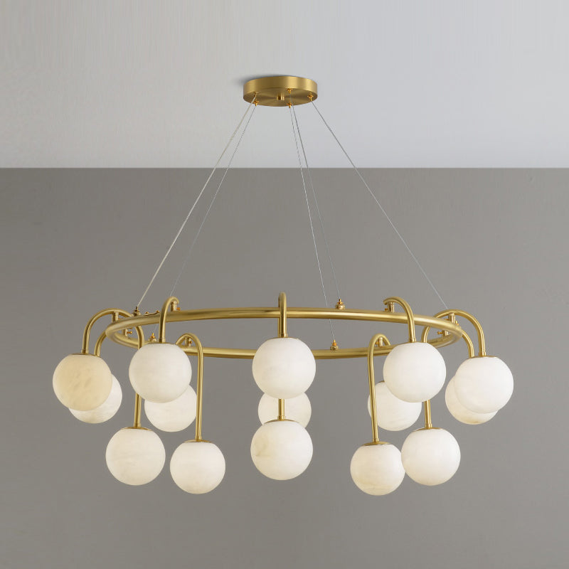 Clérachic Alabaster Globe Chandelier at its widest fifteen-light size, the brass ring circled with alabaster spheres on two levels.